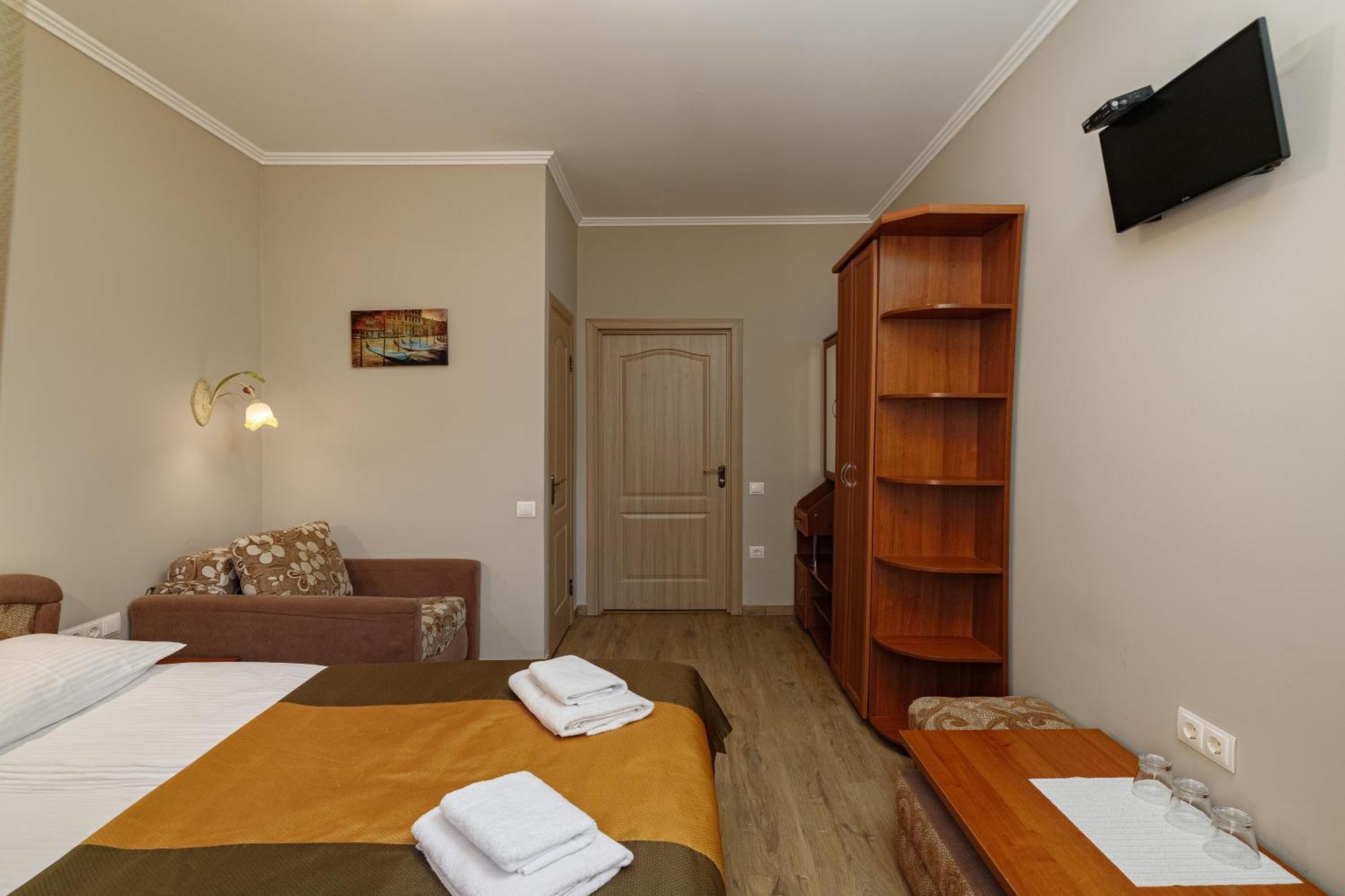Hotel Kaiser Econom Lviv Kamer foto
