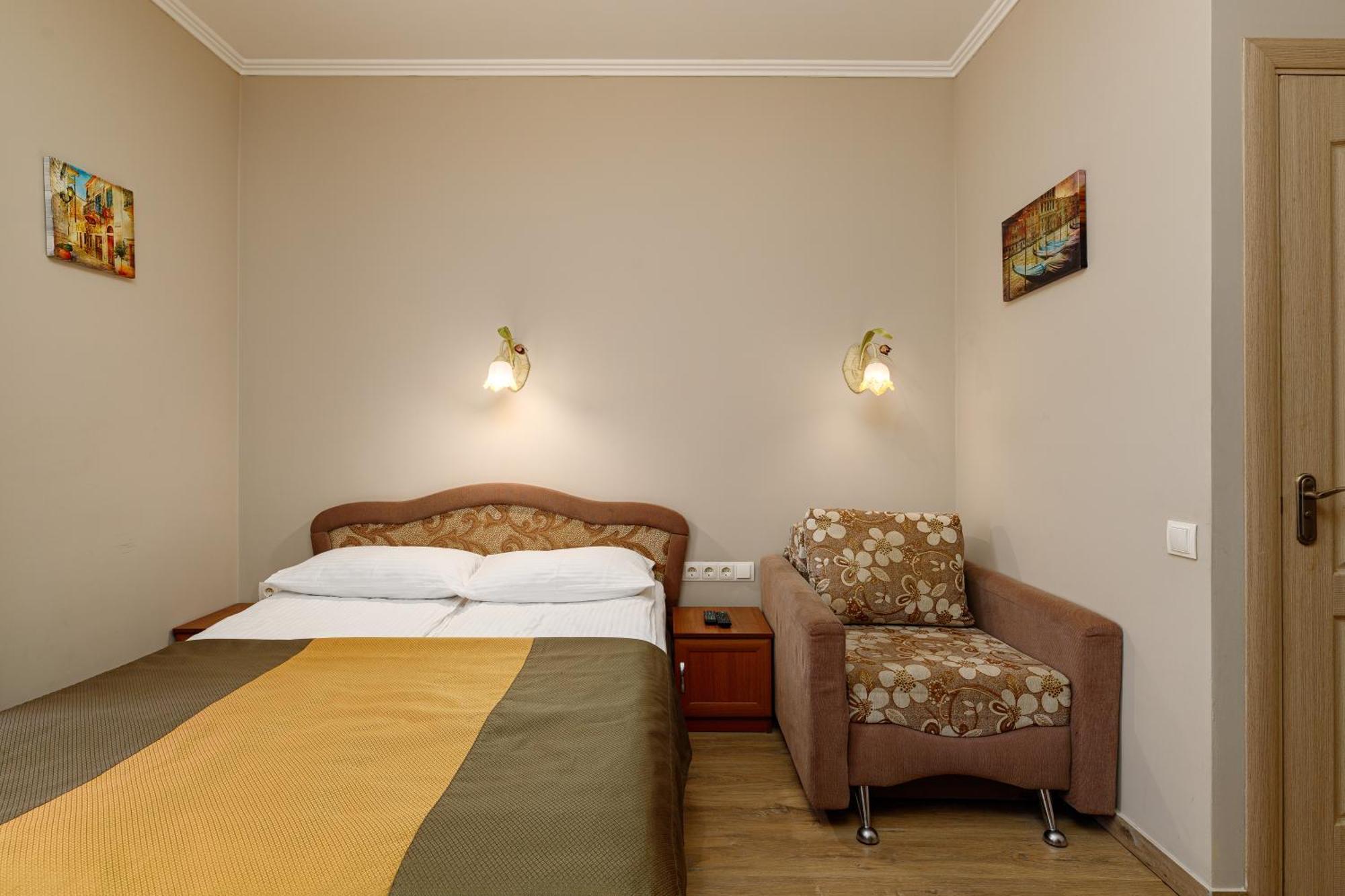 Hotel Kaiser Econom Lviv Kamer foto